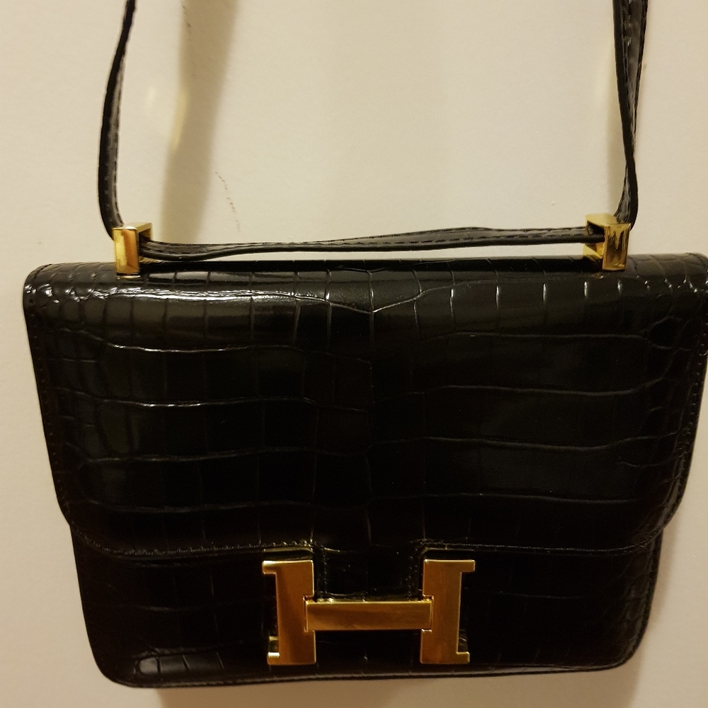 Croc leather sling bag